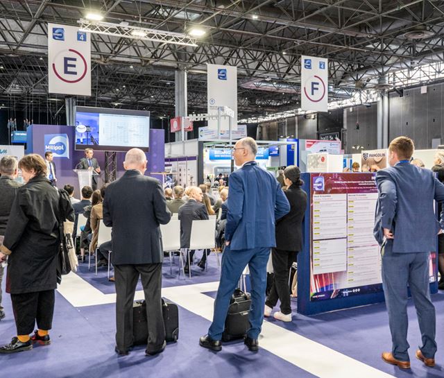 Training workshop held by an exhibitor during Milipol Paris in front of a group of participants.
