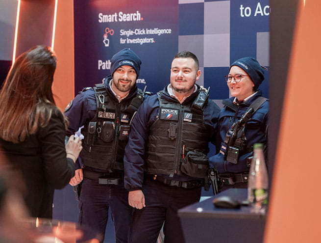 3 police officers get their picture taken